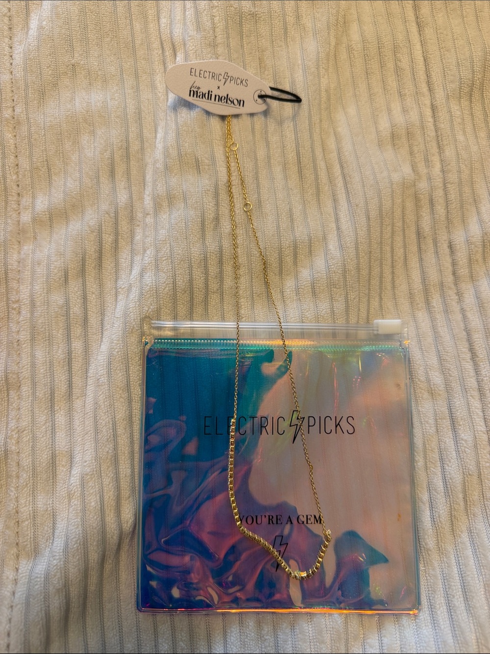 Electric picks other half Madi Nelson necklace